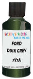 Detail brush applying Green Metallic to a small door scratch on an Ford Taurus-X, clean OEM finish