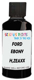 Detail brush applying Black Solid to a small door scratch on an Ford Mustang, clean OEM finish