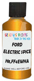 Detail brush applying Orange Metallic to a small door scratch on an Ford Edge, clean OEM finish