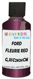 Detail brush applying Red Metallic to a small door scratch on an Ford Fiesta, clean OEM finish