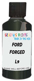 Detail brush applying Green Metallic to a small door scratch on an Ford Edge, clean OEM finish