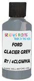 Detail brush applying Grey Metallic to a small door scratch on an Ford F-Series F-250/550 Limited, clean OEM finish