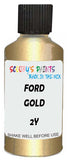Detail brush applying Gold Metallic to a small door scratch on an Ford Fairmont, clean OEM finish