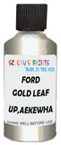 Detail brush applying Gold Metallic to a small door scratch on an Ford Escape, clean OEM finish