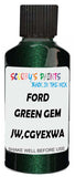Detail brush applying Green Metallic to a small door scratch on an Ford F-Series Lariat, clean OEM finish