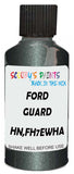 Detail brush applying Grey Metallic to a small door scratch on an Ford Fusion, clean OEM finish