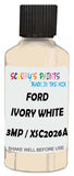 Detail brush applying White Solid to a small door scratch on an Ford Osi, clean OEM finish