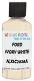 Detail brush applying White Solid to a small door scratch on an Ford Galaxy, clean OEM finish