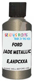 Detail brush applying Beige Metallic to a small door scratch on an Ford F-Series, clean OEM finish