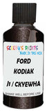 Detail brush applying Brown Metallic to a small door scratch on an Ford Bronco Sport, clean OEM finish