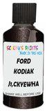 Detail brush applying Brown Metallic to a small door scratch on an Ford F-Series Platinum, clean OEM finish