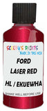 Detail brush applying Red Metallic to a small door scratch on an Ford Probe, clean OEM finish