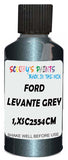 Detail brush applying Grey Metallic to a small door scratch on an Ford Granada, clean OEM finish