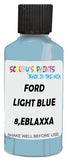 Detail brush applying Blue Solid to a small door scratch on an Ford Bronco, clean OEM finish