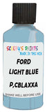 Detail brush applying Blue Solid to a small door scratch on an Ford Bronco, clean OEM finish