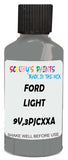 Detail brush applying Black Solid to a small door scratch on an Ford Ranger, clean OEM finish