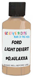 Detail brush applying Beige Solid to a small door scratch on an Ford Tempo, clean OEM finish