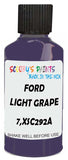 Detail brush applying Purple Solid to a small door scratch on an Ford Fiesta, clean OEM finish
