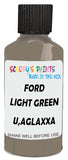 Detail brush applying Green Solid to a small door scratch on an Ford Medium Truck, clean OEM finish