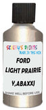 Detail brush applying Beige Metallic to a small door scratch on an Ford Explorer, clean OEM finish