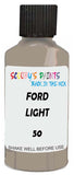 Detail brush applying Beige Solid to a small door scratch on an Ford Festiva, clean OEM finish