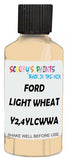 Detail brush applying Beige Solid to a small door scratch on an Ford Trucks, clean OEM finish