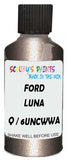 Detail brush applying Beige Metallic to a small door scratch on an Ford Focus Coupe-Cabriolet, clean OEM finish