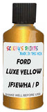 Detail brush applying Yellow Metallic to a small door scratch on an Ford Ecosport, clean OEM finish