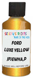 Detail brush applying Yellow Metallic to a small door scratch on an Ford Fiesta St, clean OEM finish