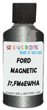 Detail brush applying Grey Metallic to a small door scratch on an Ford Edge, clean OEM finish