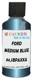 Detail brush applying Blue Metallic to a small door scratch on an Ford Econoline, clean OEM finish