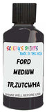 Detail brush applying Grey Solid to a small door scratch on an Ford Explorer, clean OEM finish