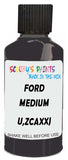 Detail brush applying Grey Solid to a small door scratch on an Ford Escort, clean OEM finish
