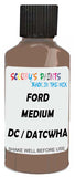 Detail brush applying Brown Solid to a small door scratch on an Ford Navajo, clean OEM finish
