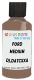 Detail brush applying Brown Solid to a small door scratch on an Ford F-Series, clean OEM finish