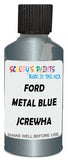 Detail brush applying Blue Metallic to a small door scratch on an Ford Truck, clean OEM finish