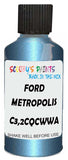 Detail brush applying Blue Metallic to a small door scratch on an Ford Transit, clean OEM finish