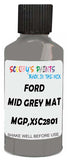 Detail brush applying Grey Solid to a small door scratch on an Ford Focus, clean OEM finish