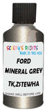 Detail brush applying Grey Metallic to a small door scratch on an Ford Econoline, clean OEM finish