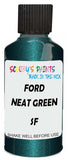 Detail brush applying Green Metallic to a small door scratch on an Ford Probe, clean OEM finish
