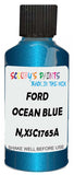 Detail brush applying Blue Metallic to a small door scratch on an Ford Scoop, clean OEM finish