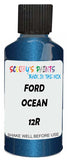 Detail brush applying Blue Metallic to a small door scratch on an Ford Ranger, clean OEM finish