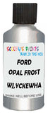 Detail brush applying White Metallic to a small door scratch on an Ford Mustang, clean OEM finish