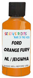 Detail brush applying Orange Metallic to a small door scratch on an Ford Focus Specialty Vehicle, clean OEM finish