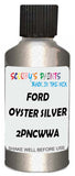 Detail brush applying Silver Metallic to a small door scratch on an Ford Transit Connect, clean OEM finish