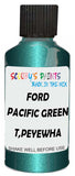 Detail brush applying Green Metallic to a small door scratch on an Ford Puma, clean OEM finish