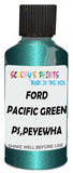 Detail brush applying Green Metallic to a small door scratch on an Ford Contour, clean OEM finish