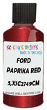 Detail brush applying Red Metallic to a small door scratch on an Ford Fiesta, clean OEM finish