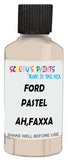 Detail brush applying White Solid to a small door scratch on an Ford Escort, clean OEM finish
