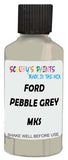 Detail brush applying Grey Solid to a small door scratch on an Ford Transit, clean OEM finish